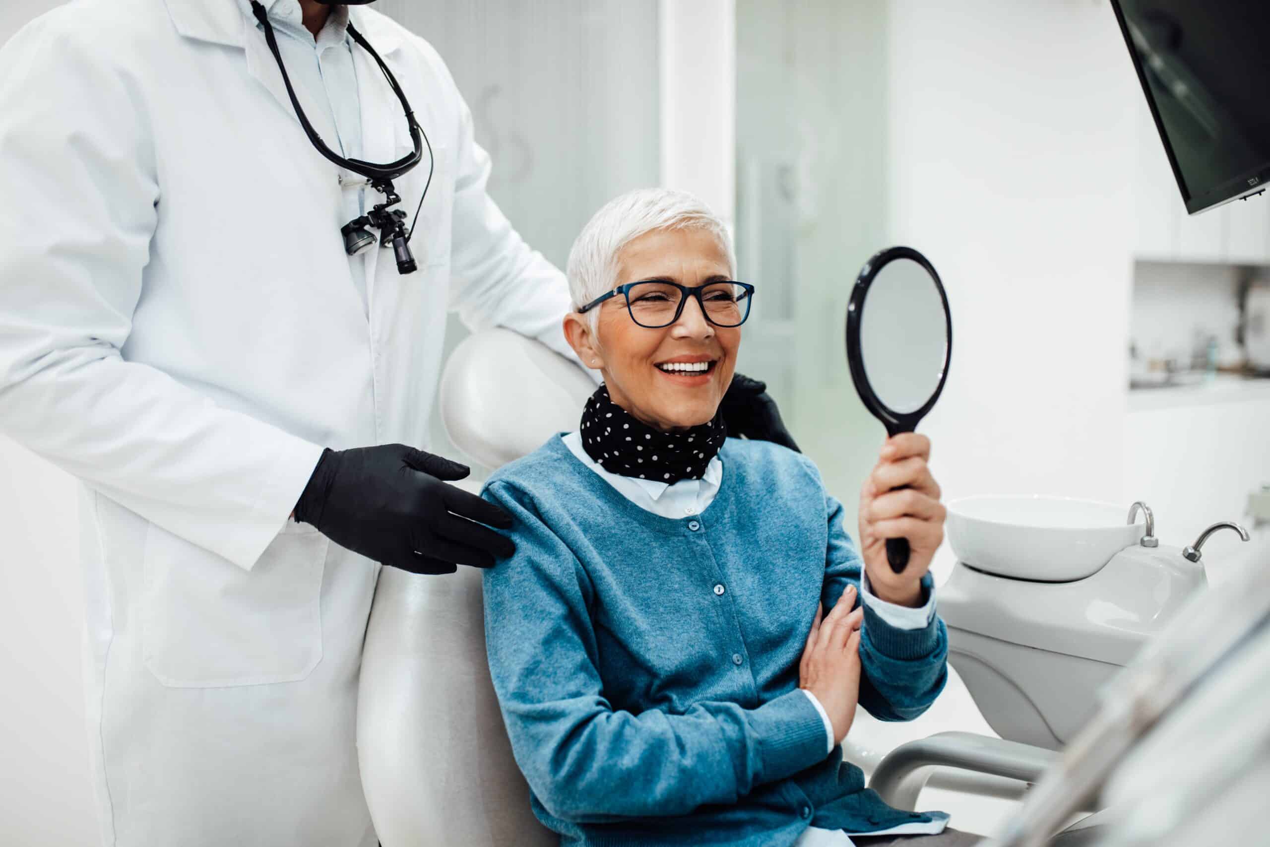 Beautiful,Senior,Woman,Having,Dental,Treatment,At,Dentist's,Office.