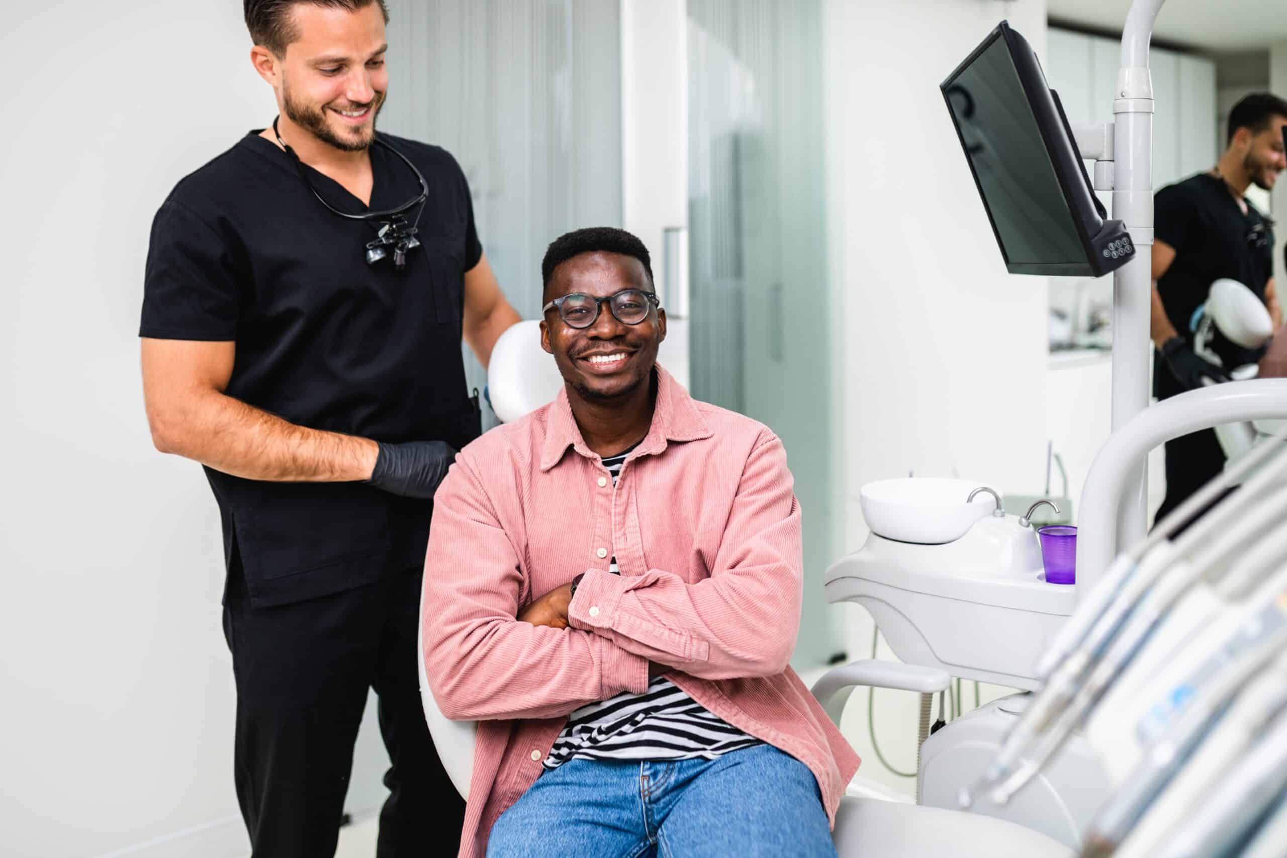 African,American,Man,Satisfied,After,Having,Dental,Treatment,At,Dentist's