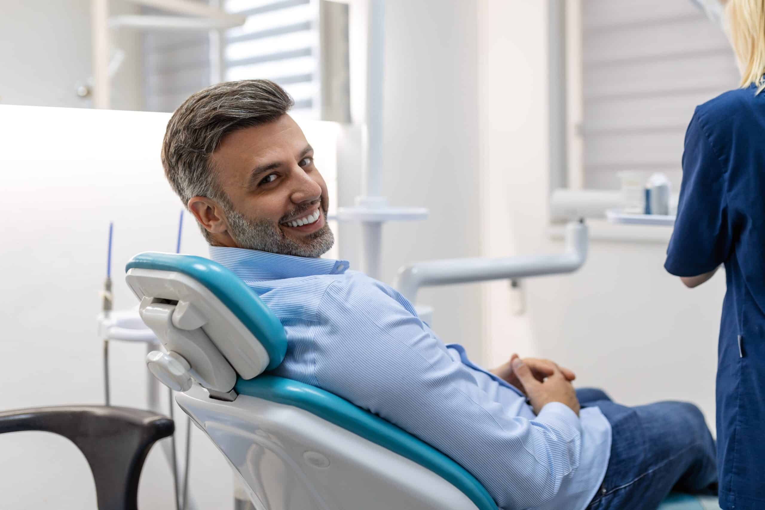 Image,Of,Satisfied,Man,Sitting,In,Dental,Chair,At,Medical