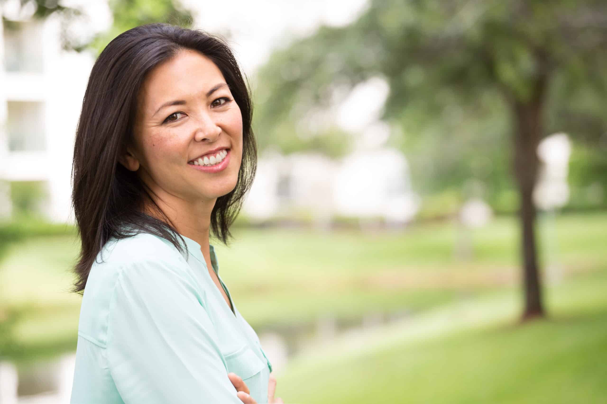 Portrait,Of,Happy,Woman,Outside.