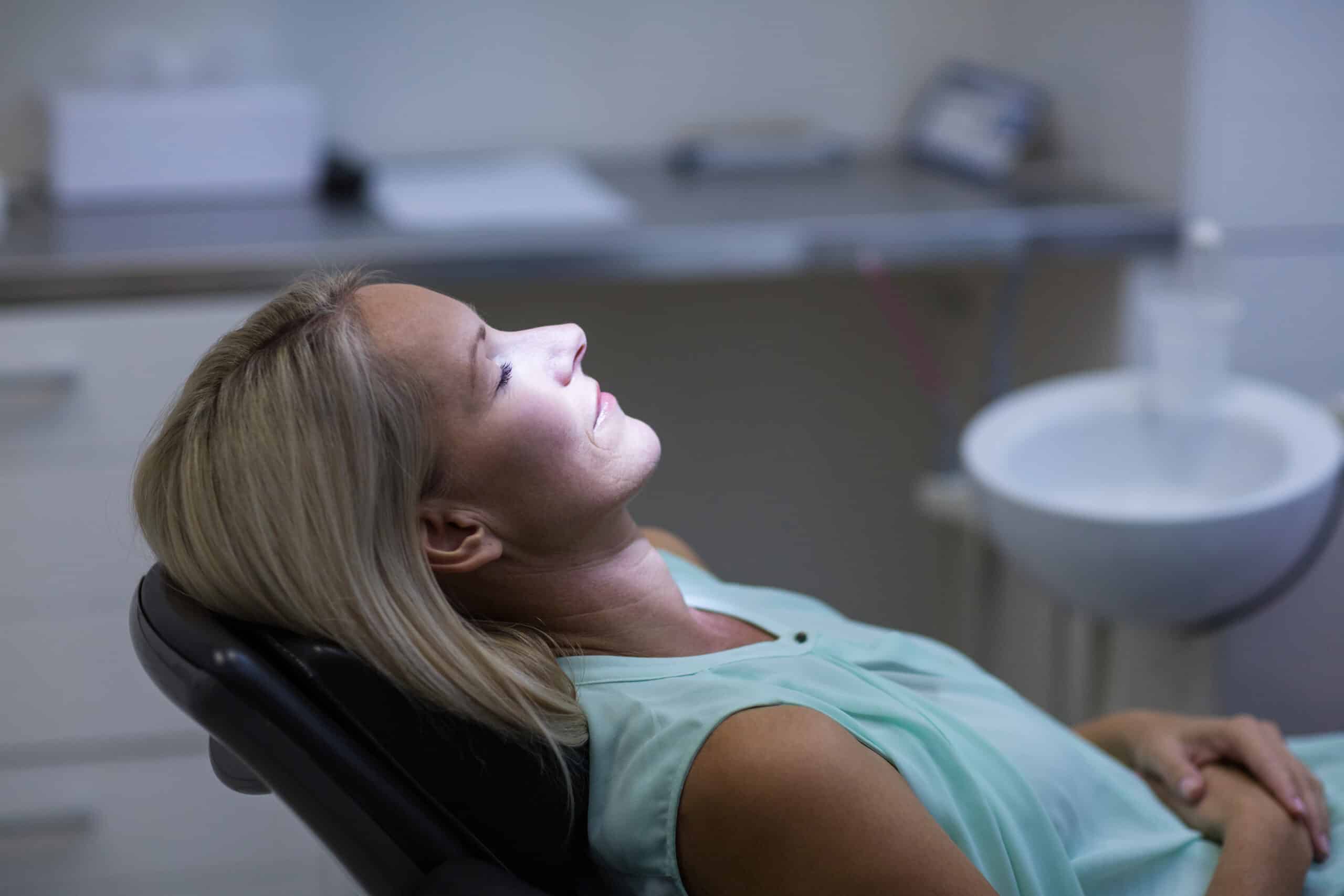 Woman,Relaxing,On,Dentist,Chair,In,Dental,Clinic