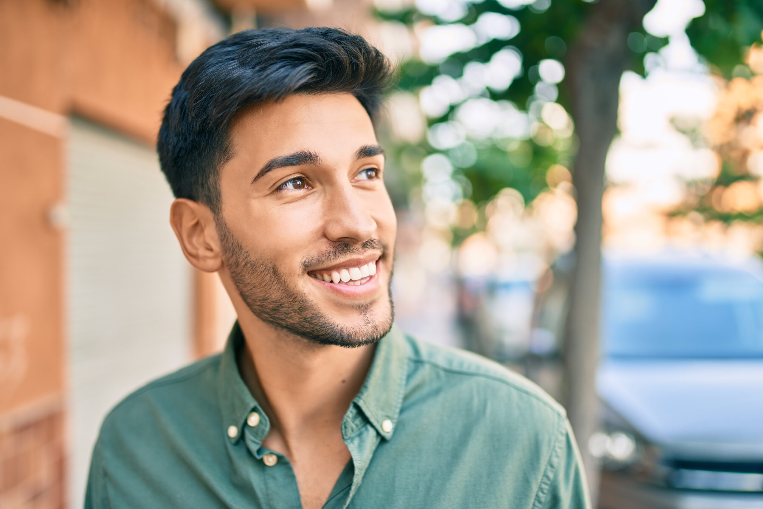 Young,Latin,Man,Smiling,Happy,Walking,At,The,City.